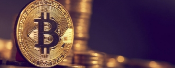 Bitcoin a scăzut la valorile din noiembrie